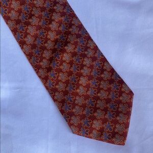 Elegant Rust and Blue Silk Tie with Geometric Pattern